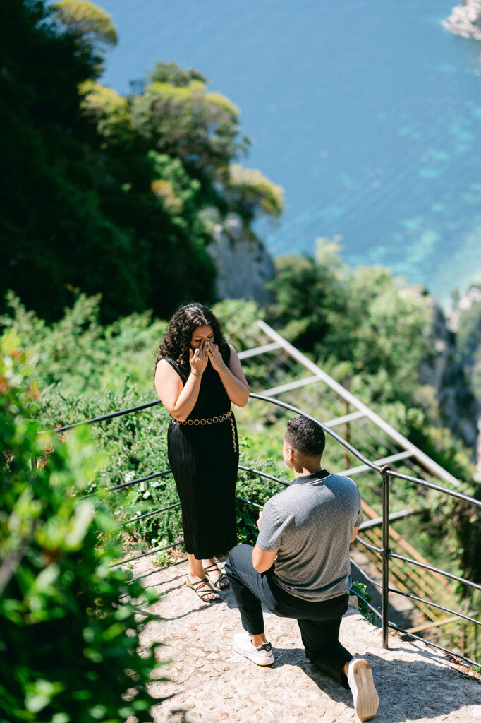 Elegant Proposal editorial-style couple portraits in Jardin Exotique in Eze, French Riviera