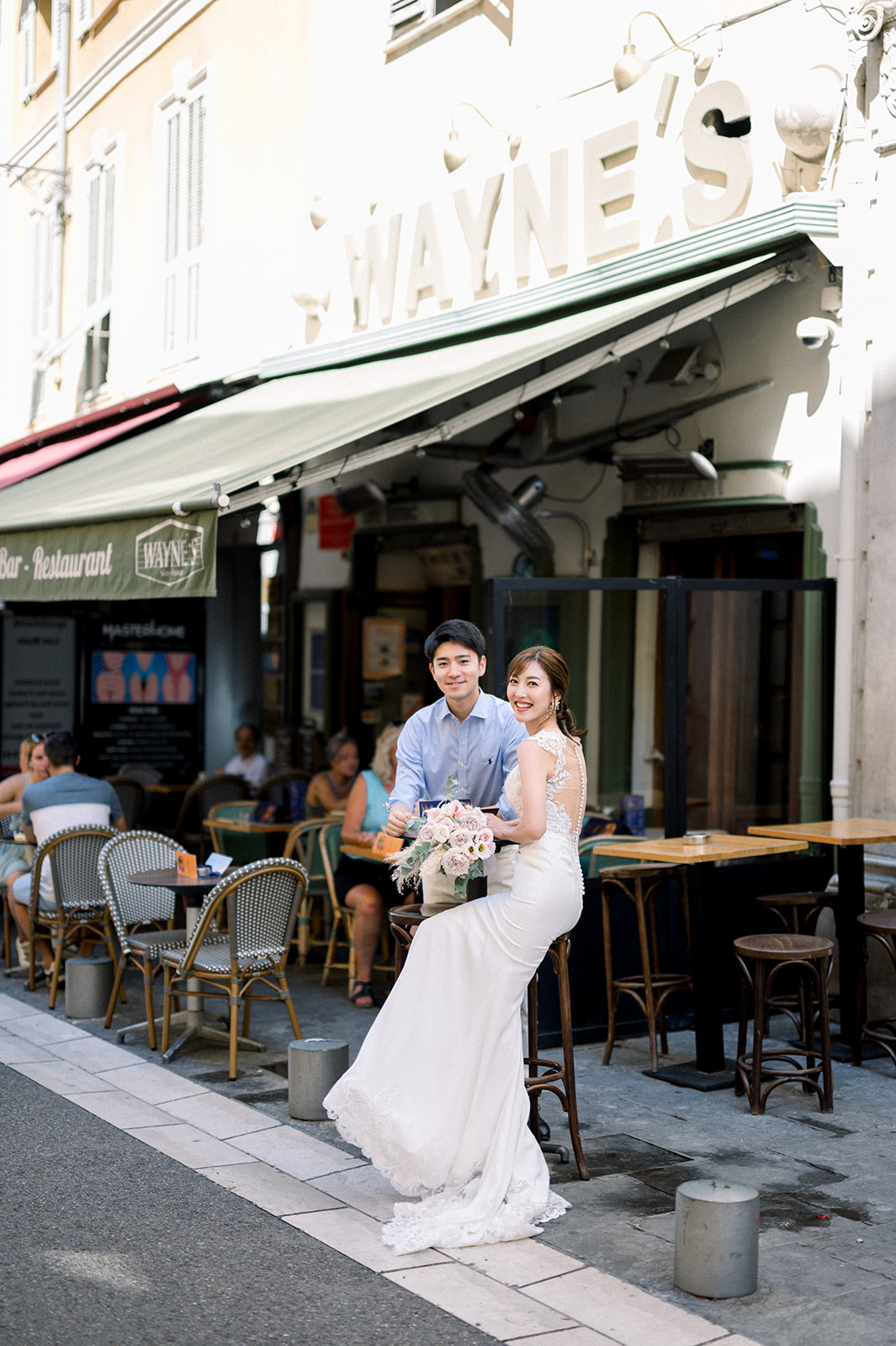 Editorial-style engagement session in Nice old town with golden light