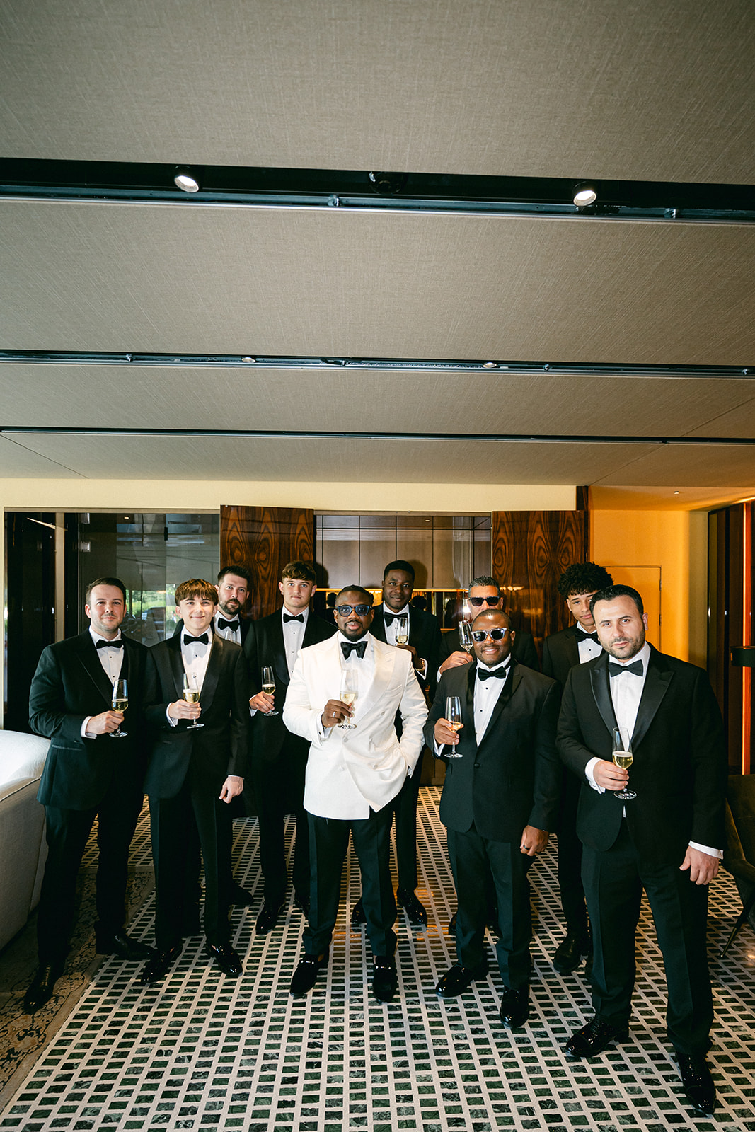 Ope and his groomsmen gathering outside the hotel before the Lake Como wedding.