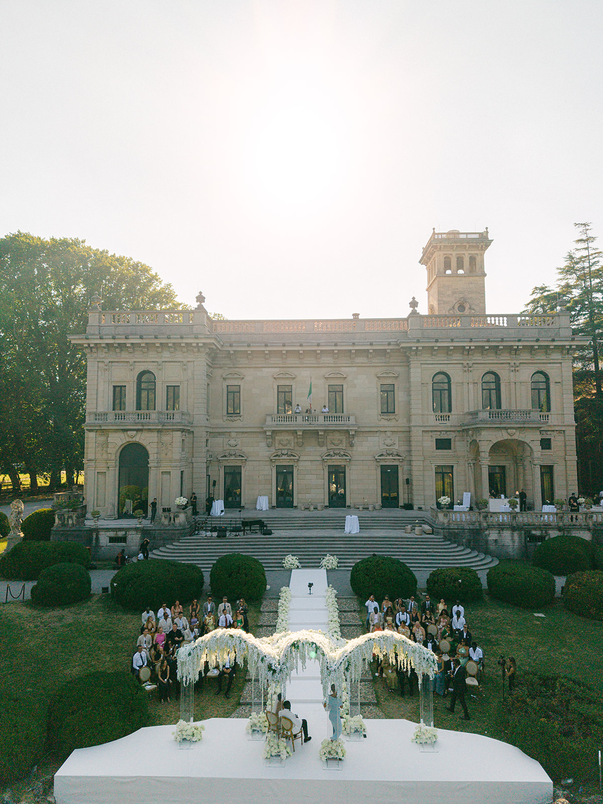 Villa Erba and its lakeside wedding ceremony setting photographed in the evening light.